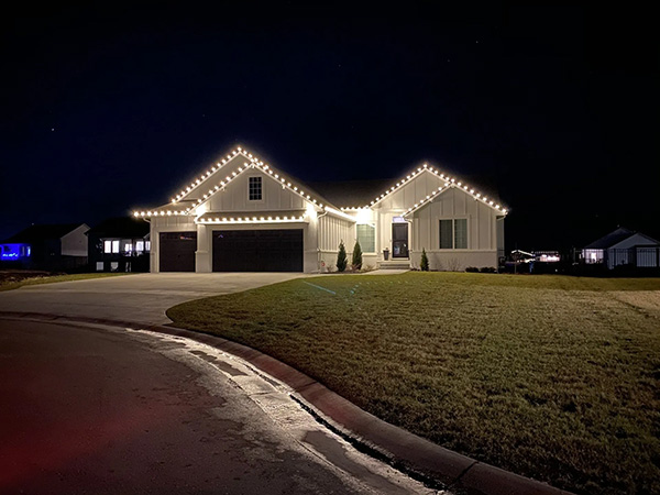 white home with white holiday lighting